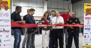 Peggy Wills cutting the Celebrity Fan Fest ribbon